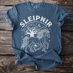 Blue t-shirt with white graphic of Sleipnir, Norse mythology eight legged horse.
