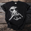 Black t-shirt with Cthulhu illustration making heart shape around lighthouse.