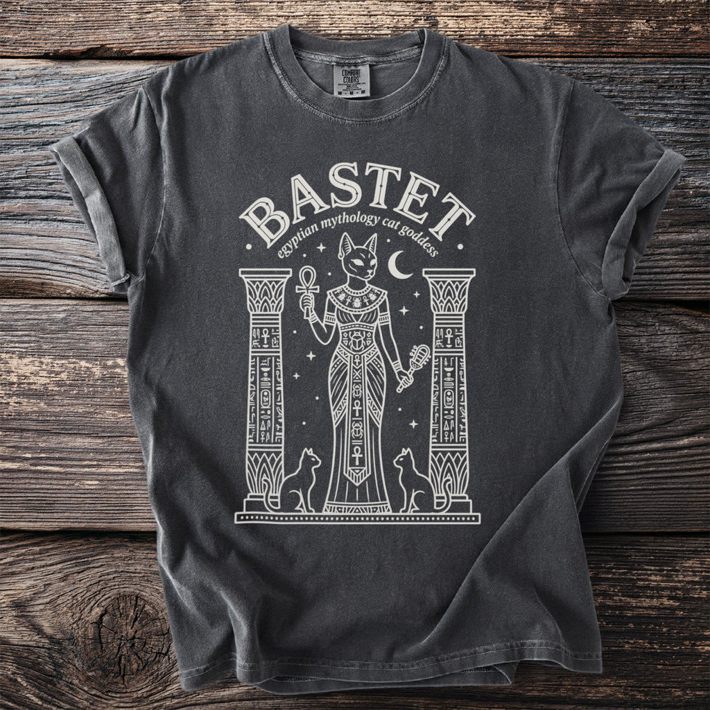 Front of t-shirt with "BASTET egyptian mythology cat goddess" and feline goddess graphic.