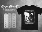 Black t-shirt with "no thoughts head empty" graphic and size chart.