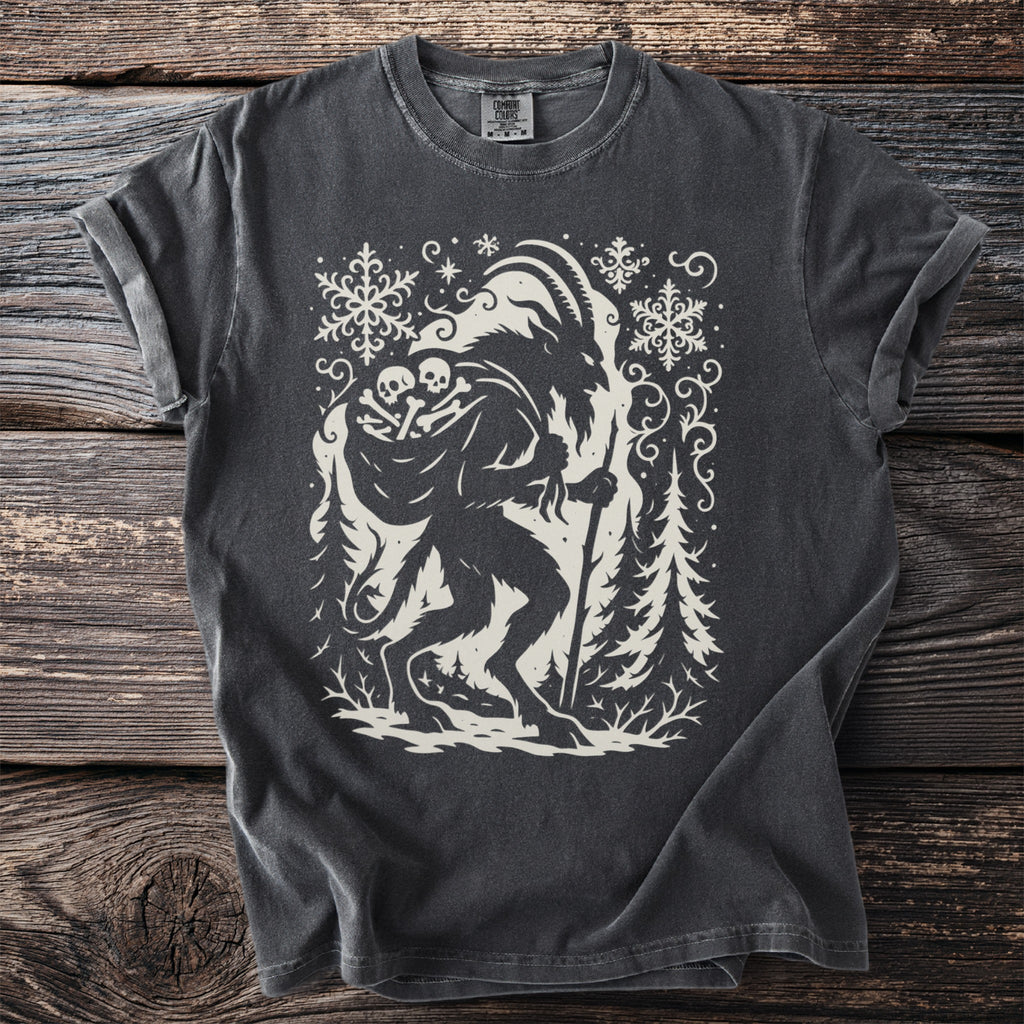 Dark grey t-shirt with a cream silhouette of Krampus carrying a sack of bones.
