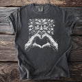 Dark grey t-shirt with a white graphic of a green man and heart-shaped hands.