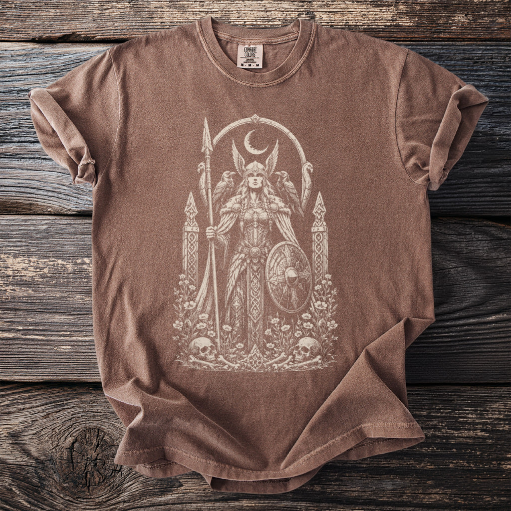 Brown t-shirt with a cream-colored graphic of a Viking woman with skulls and flowers below.