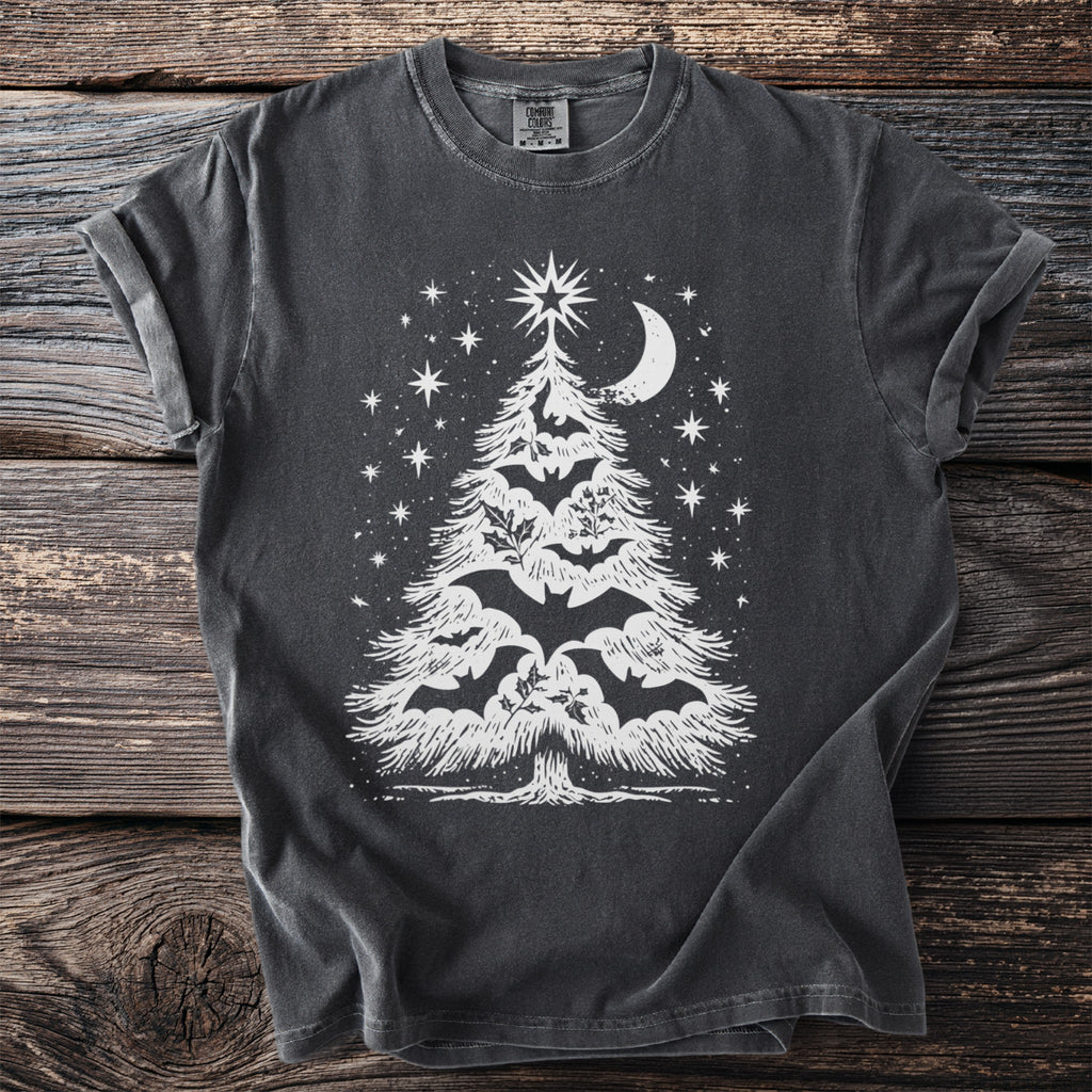 Dark gray t-shirt with white graphic of bat-adorned Christmas tree under moon and stars.