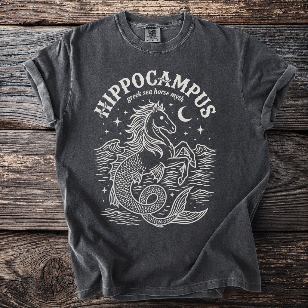 Dark t-shirt with white line art of a hippocampus and text "Hippocampus greek sea horse myth".