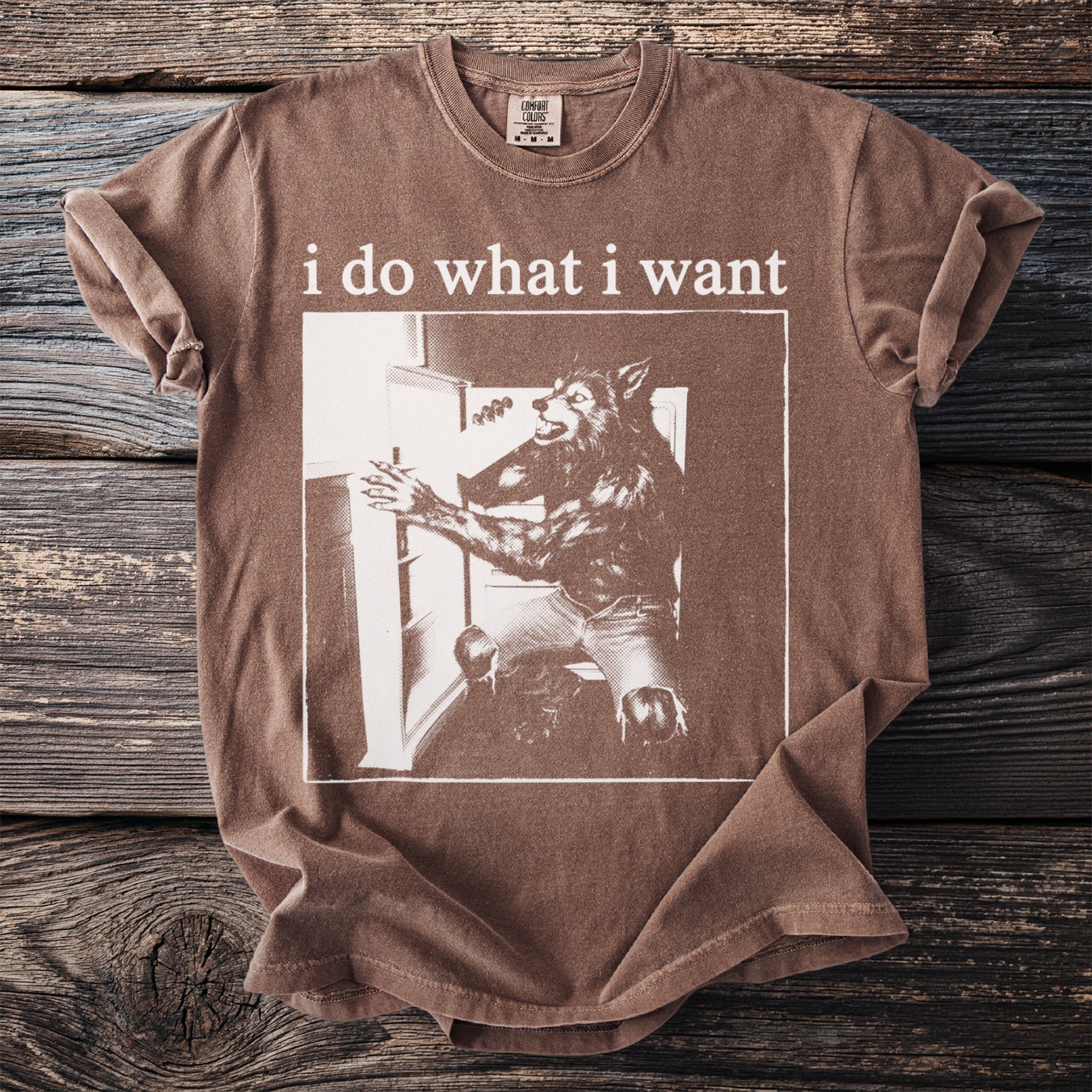 Brown t-shirt with white text "i do what i want" and werewolf graphic.