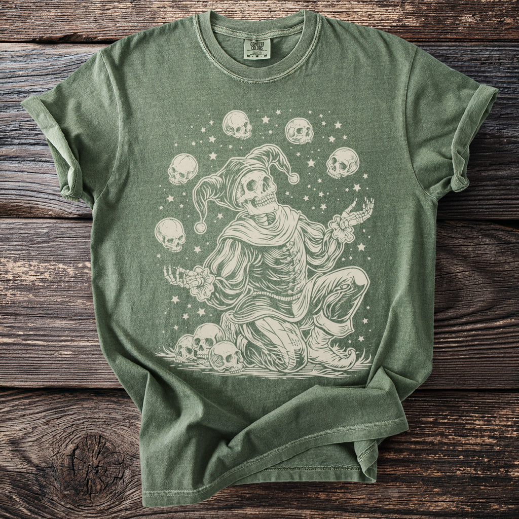 Green t-shirt with skeleton jester juggling skulls and stars graphic