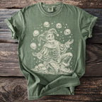 Green t-shirt with skeleton jester juggling skulls and stars graphic