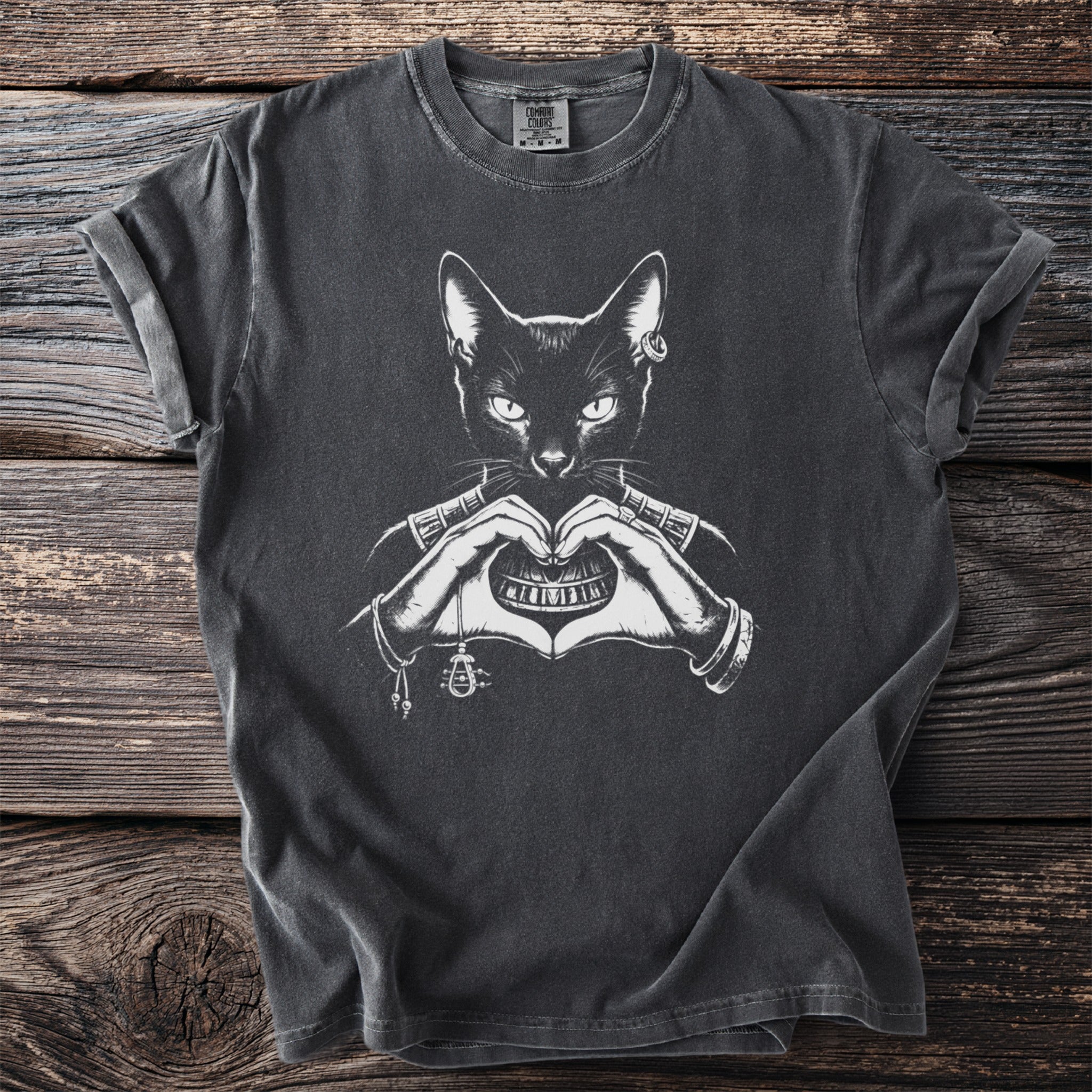 Black t-shirt with a white graphic of a cat forming a heart shape with its hands.