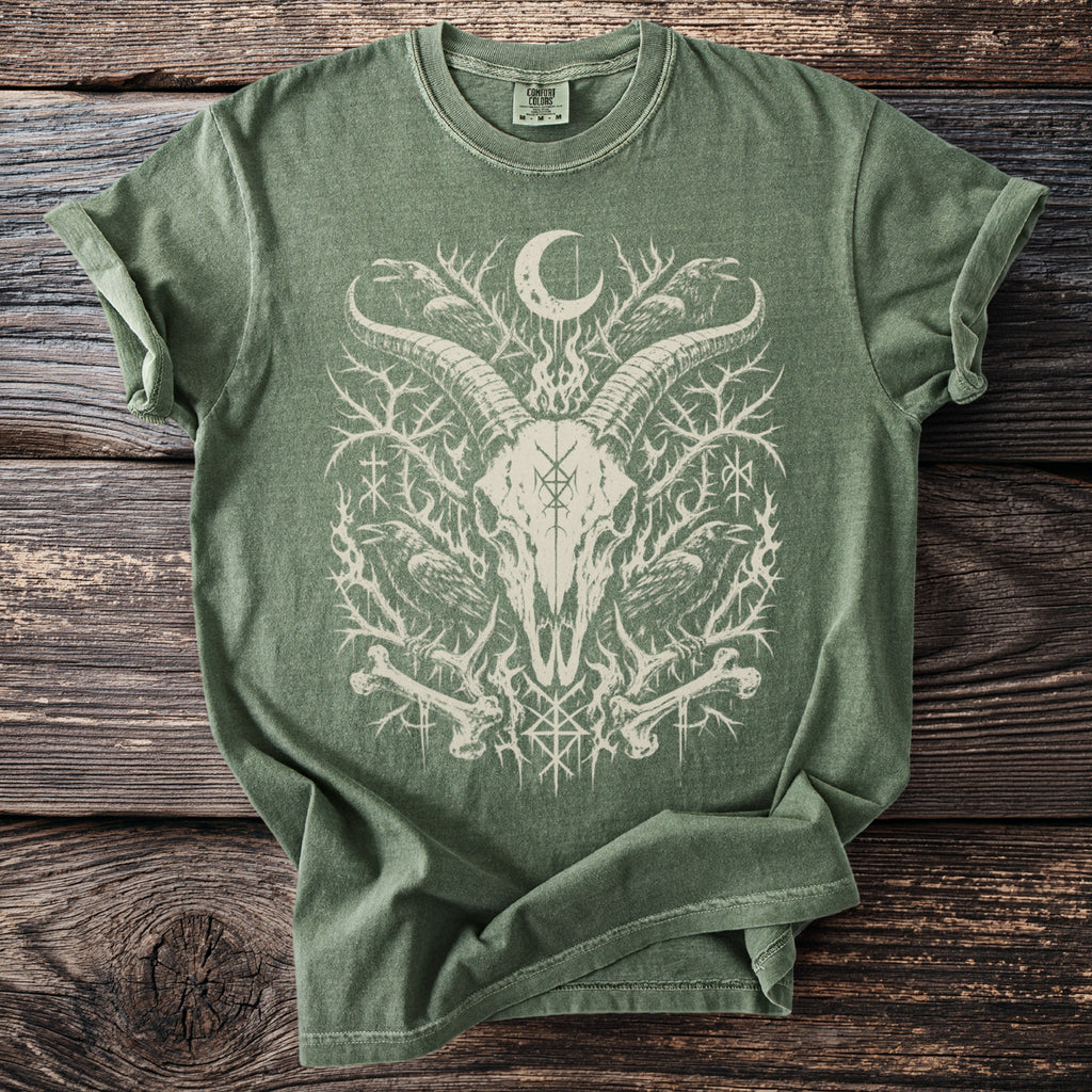 Green t-shirt with occult graphic featuring goat skull, crows, bones and moon.