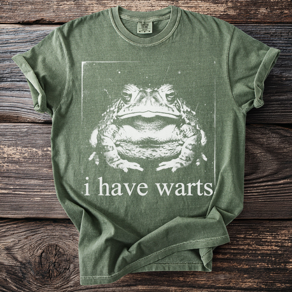 Green t-shirt with a toad graphic and text "i have warts."