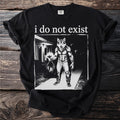 Black t-shirt with graphic of a wolf-like creature holding a trash bag, text "i do not exist."