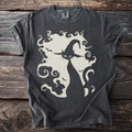 Dark grey t-shirt with a cream graphic of a black cat in a witch hat and swirling smoke.