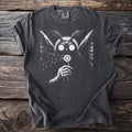 Dark t-shirt with graphic of moth-like creature blowing dandelion seeds.