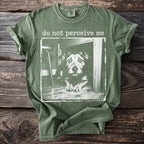 Green t-shirt with a distressed print of a dog and text "do not perceive me".