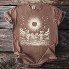 Brown t-shirt with a celestial Stonehenge graphic and "Comfort Colors" tag.