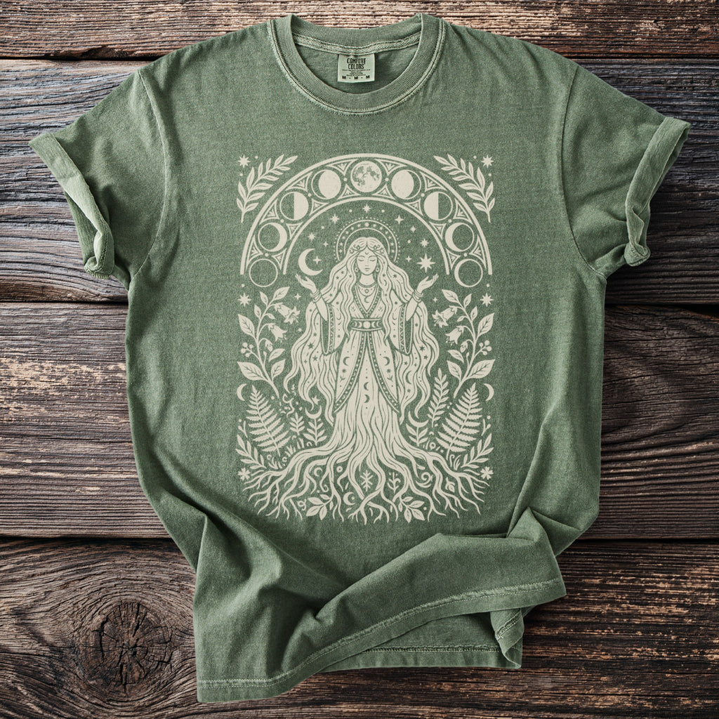 Green t-shirt with a white celestial goddess and moon phase design.