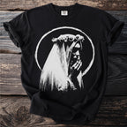 Black t-shirt with white graphic of a person in a veil holding hands to face.