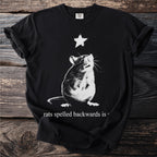 Black t-shirt with a white distressed rat graphic and text "rats spelled backwards is".