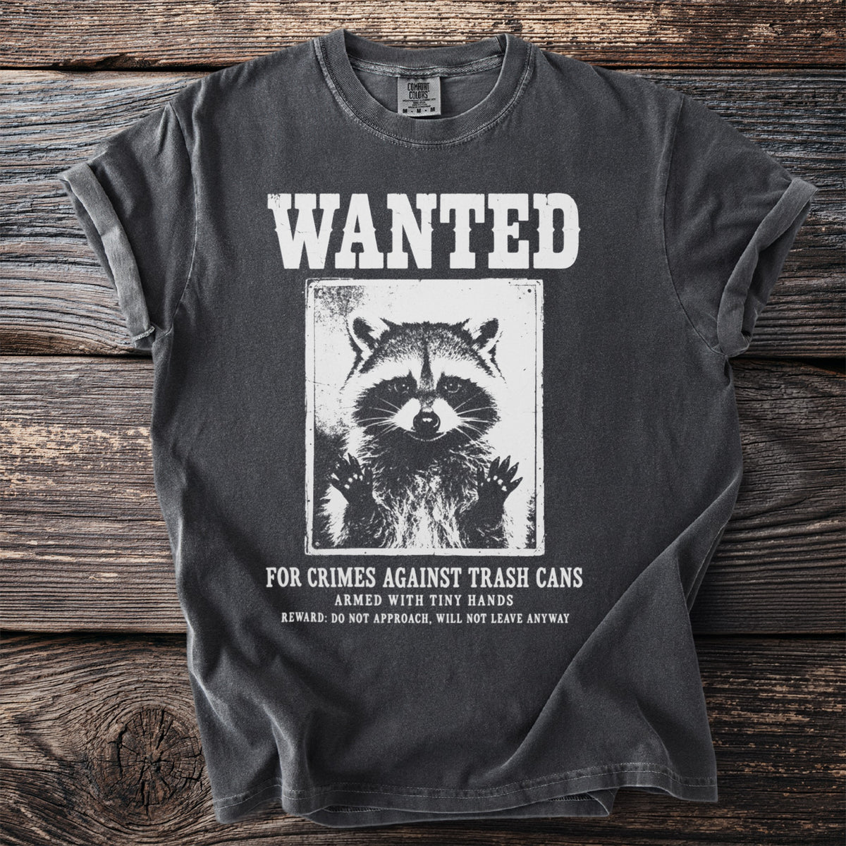 Wanted raccoon "for crimes against trash cans armed with tiny hands."
