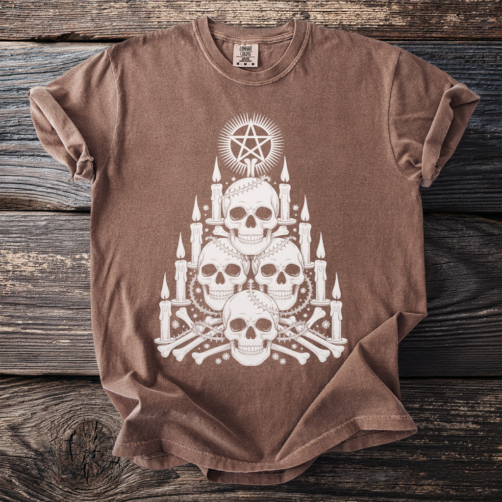 Brown t-shirt with white gothic skull, pentagram, candles, and bone graphic design.
