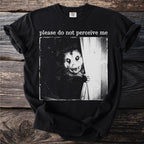Black t-shirt with a vintage-style graphic of a possum peeking from behind a curtain that reads "please do not perceive me".