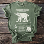 Olive green t-shirt with white graphic of a proboscis monkey and its characteristics.