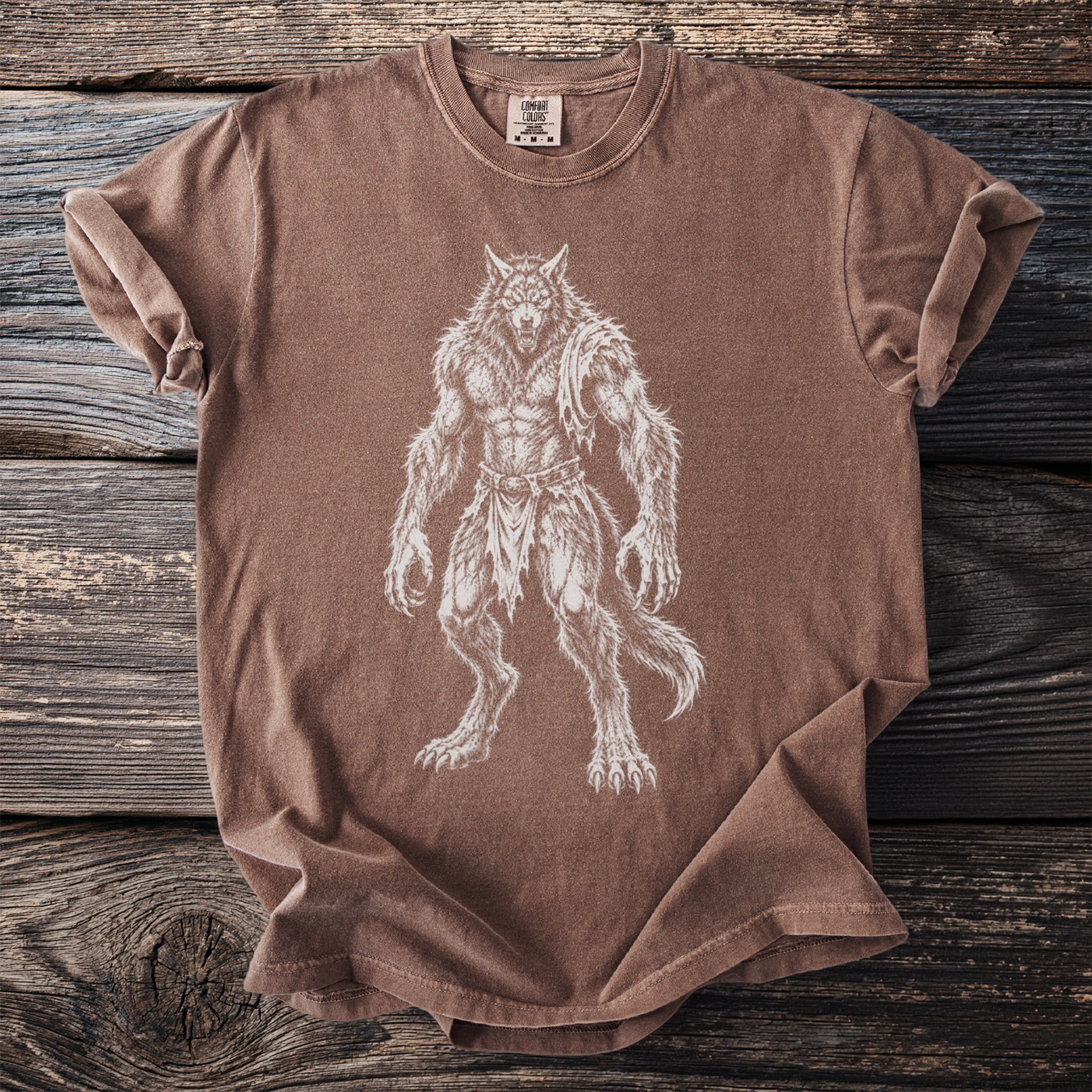 Brown t-shirt with white werewolf graphic and Comfort Colors tag.