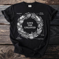 Black t-shirt with graphic of insects forming a wreath and text "Love the Unloved".