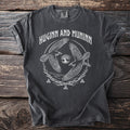 Dark t-shirt with white graphic of Huginn and Muninn ravens, Yggdrasil, and knotwork.