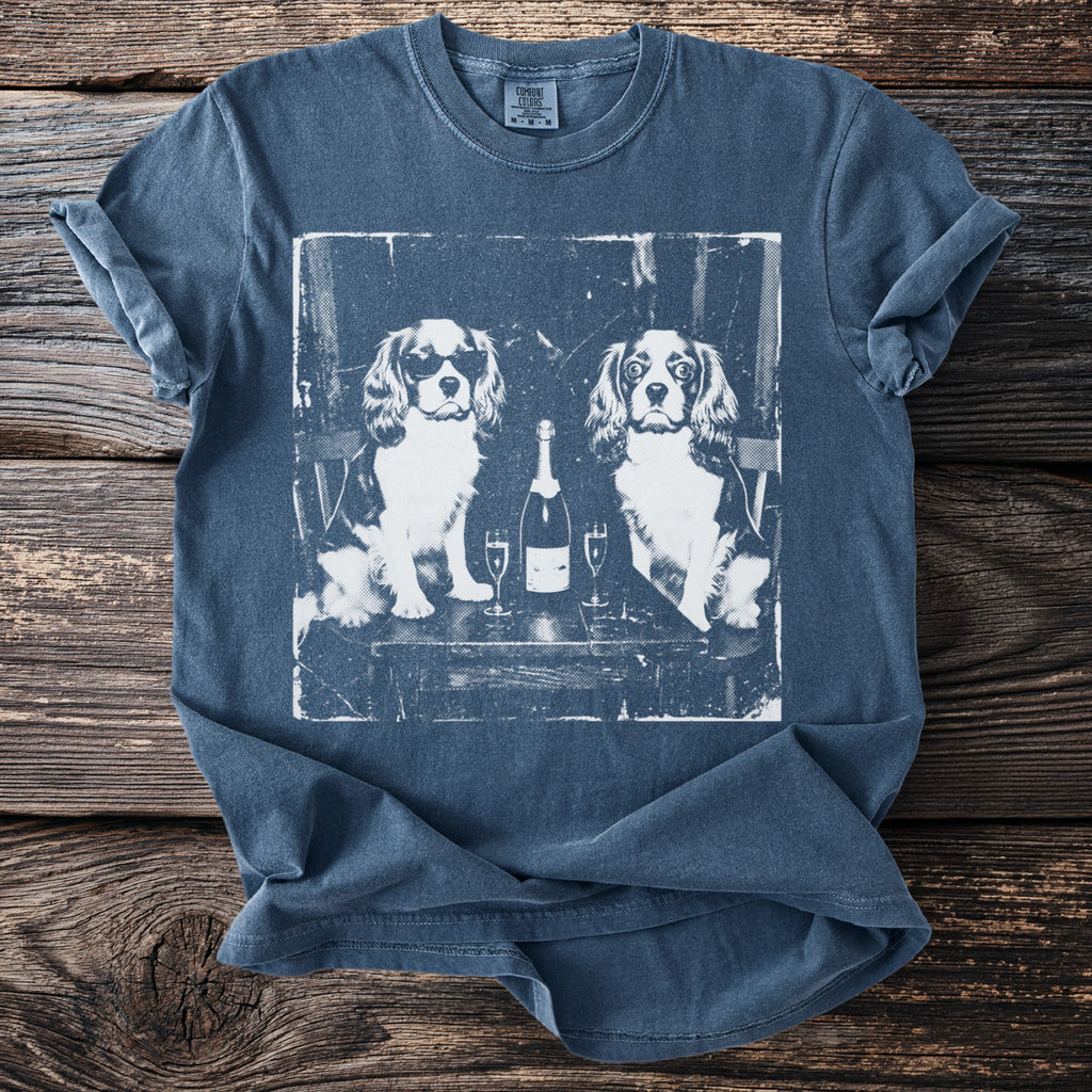 T-shirt with vintage print of two dogs and champagne with glasses.