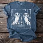 T-shirt with vintage print of two dogs and champagne with glasses.