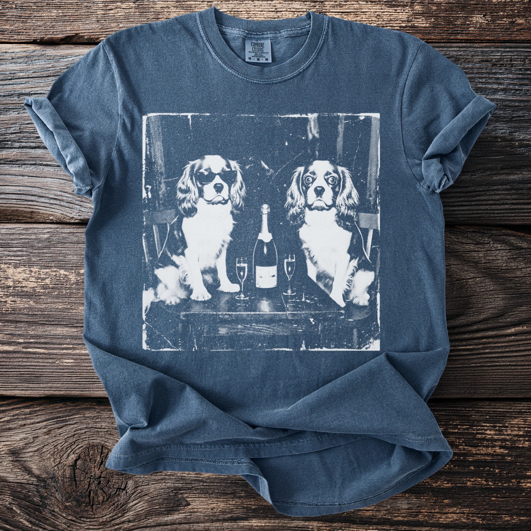 T-shirt with vintage print of two dogs and champagne with glasses.