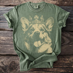Green t-shirt with a vintage print of a corgi wearing a crown.