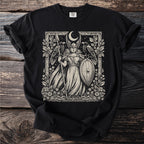 Black t-shirt with a vintage-style print of a warrior woman with helmet, spear, and shield.