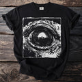 Black t-shirt with a distressed graphic of a boat seen through a tunnel.