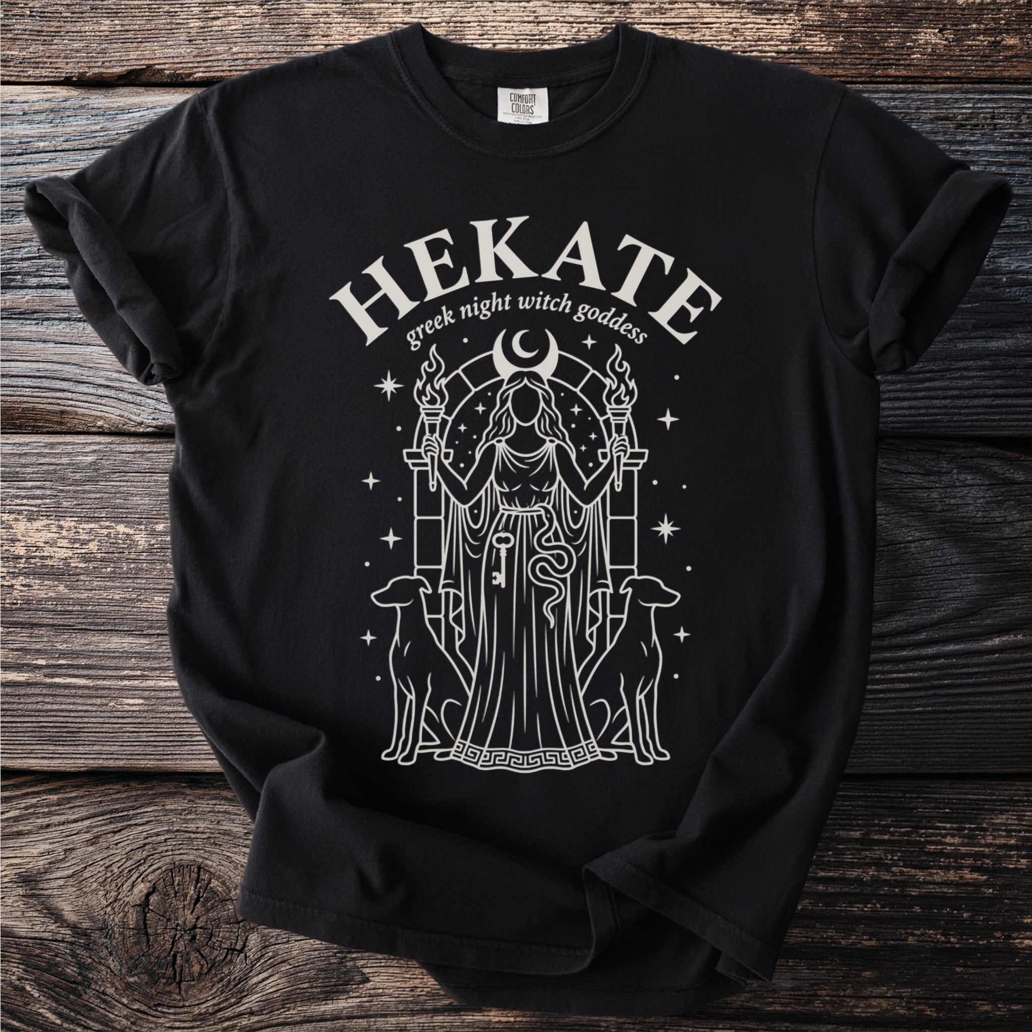 Black t-shirt with Hekate Greek night witch goddess graphic, holding torches and key.
