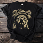Black t-shirt with gold distressed print of a koala wearing a beanie.