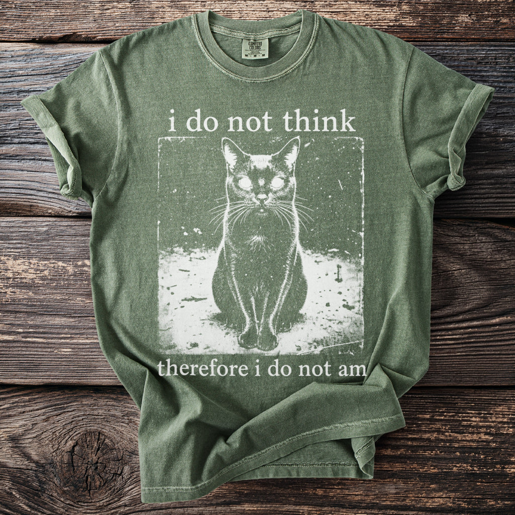 Green shirt with black cat graphic and text: "i do not think therefore i do not am."
