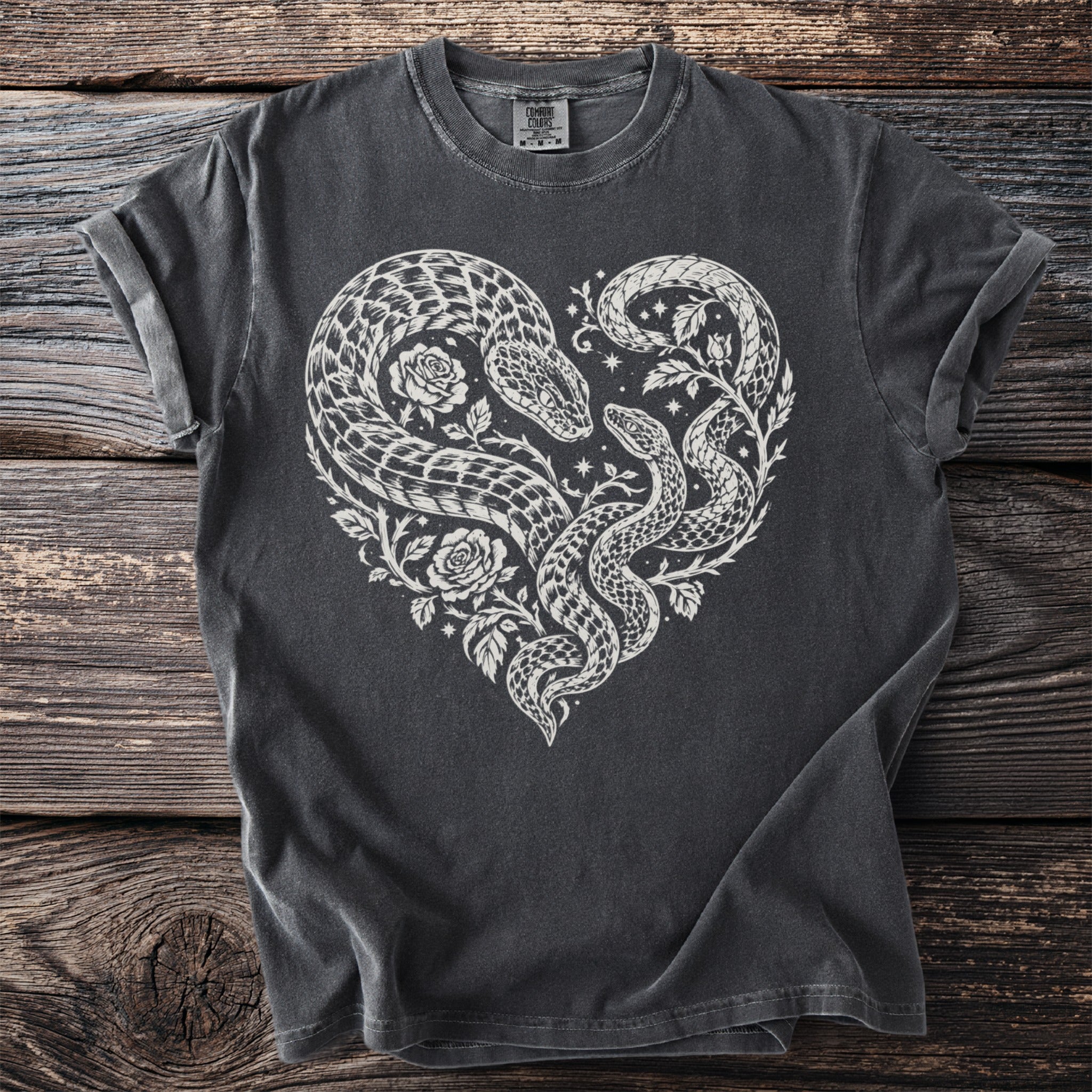 Dark gray t-shirt with a white heart-shaped snake and rose graphic.