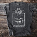 T-shirt with "The Lost Trail Society" and a forest scene with hikers and a figure.