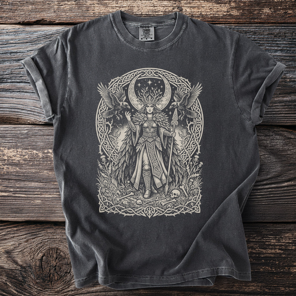 Dark t-shirt featuring a print of a Celtic goddess with ravens, moon, and skulls.