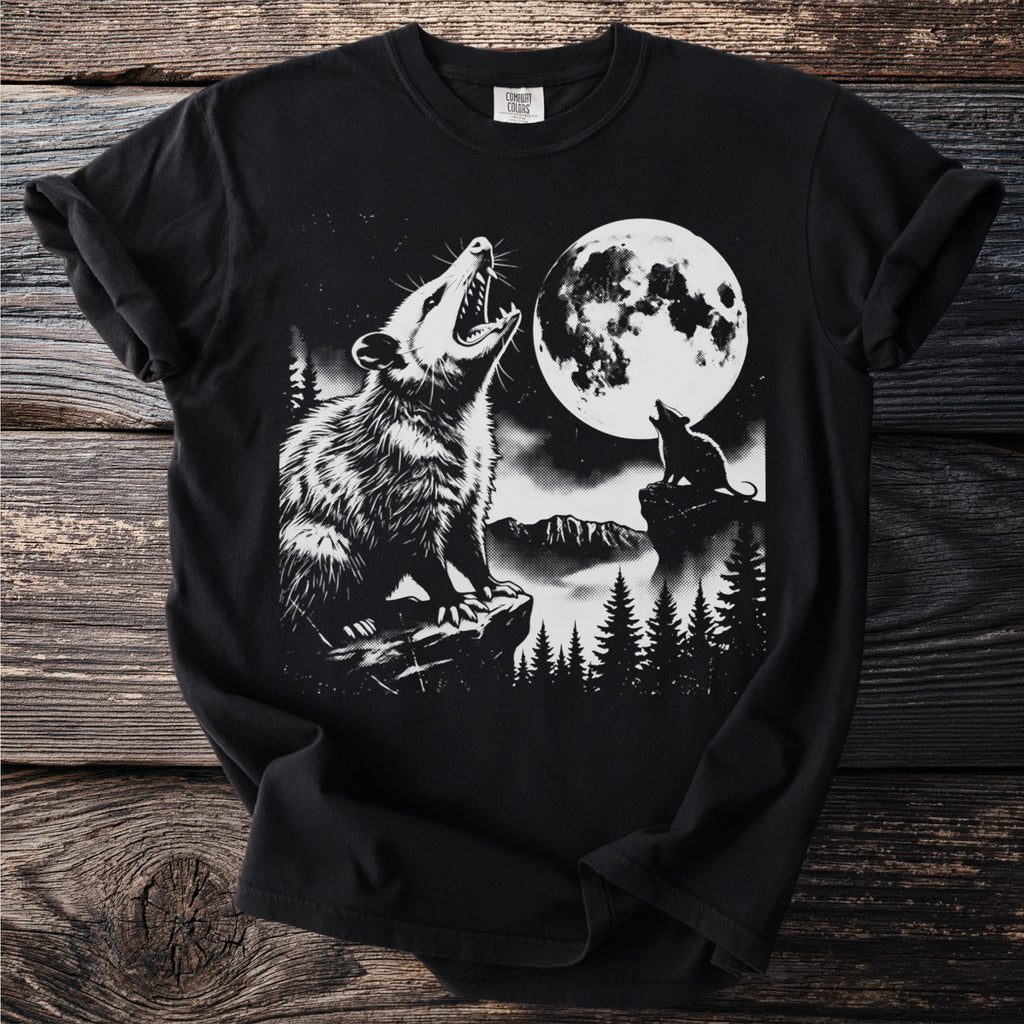 Black t-shirt with opossum and wolf howling at a full moon.