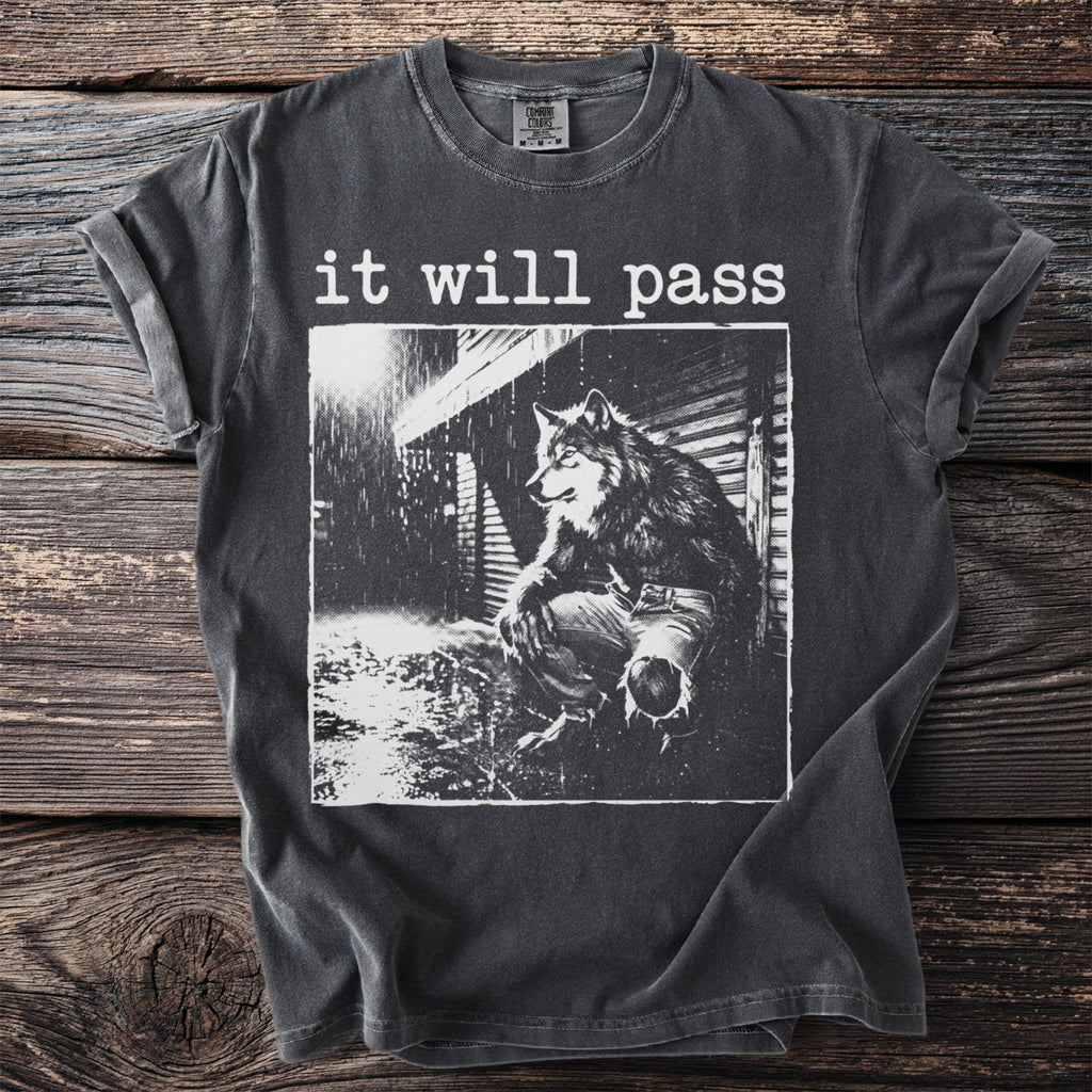 Dark t-shirt with "it will pass" text and a werewolf graphic.