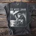 Dark t-shirt with "it will pass" text and a werewolf graphic.