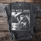 Dark t-shirt with "it will pass" text and a werewolf graphic.