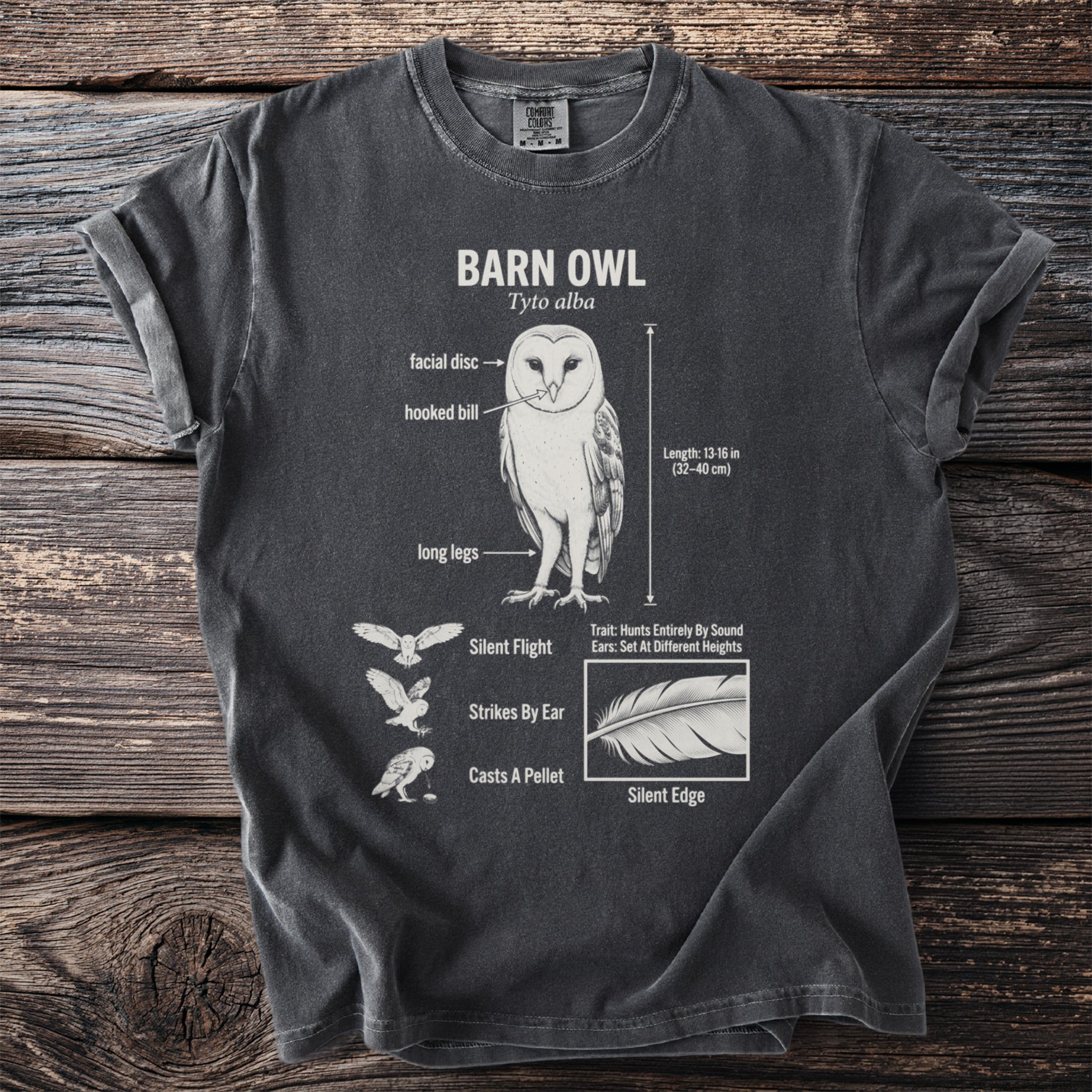 Barn owl anatomy diagram on a charcoal t-shirt with text labels.