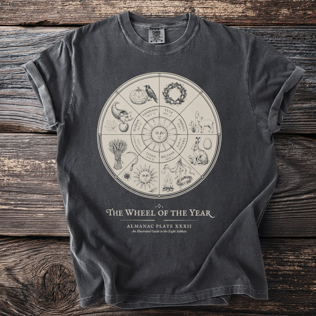 Dark grey t-shirt with "The Wheel of the Year" almanac plate design.