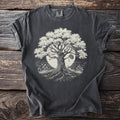 Dark grey t-shirt with a cream-colored tree of life graphic on a circular background.