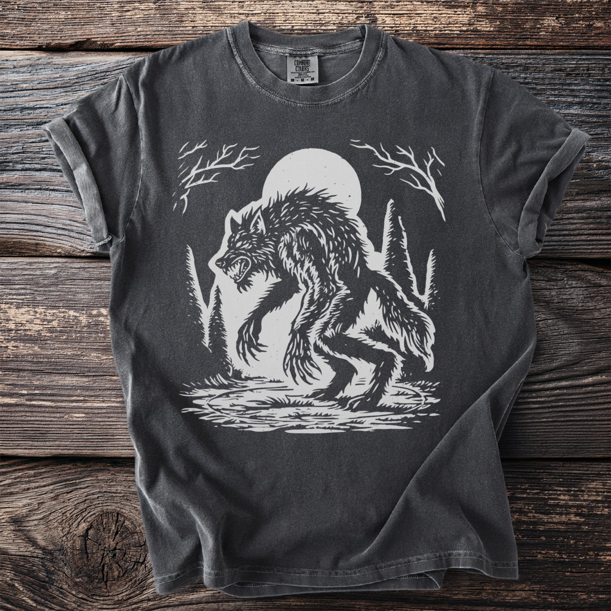 Dark gray t-shirt with a white werewolf graphic under a full moon.